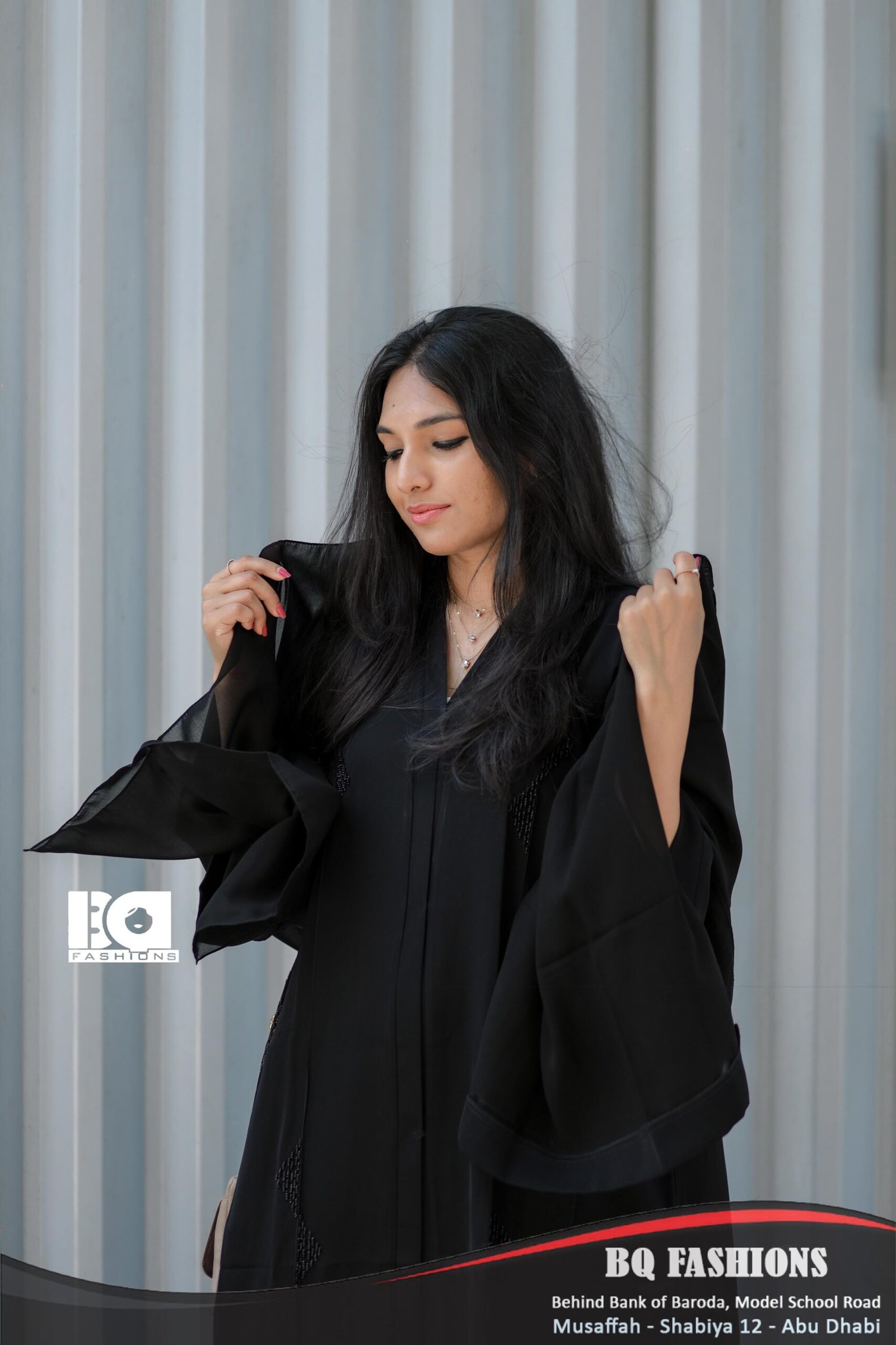 Midnight Elegance Abaya - Women's black modest Islamic dress with flowing sleeves and open front design