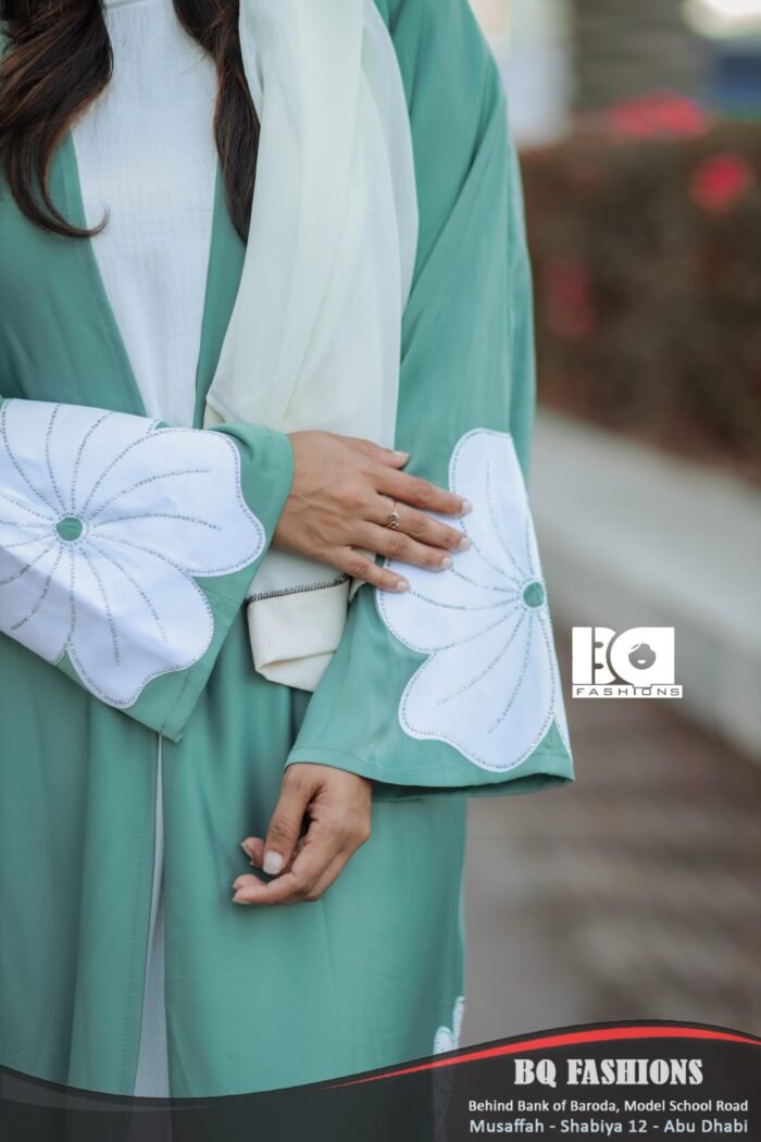 Mint Blossom Floral Abaya - Women's mint green modest Islamic dress with white floral print and flowing silhouette