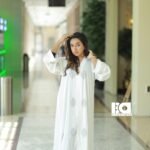 White Feather Print Abaya - Elegant white modest dress with gray feather motifs and flowing silhouette