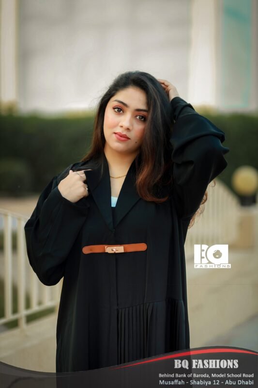 Black Pleated Belted Abaya - Women's black modest Islamic dress with pleated hem details and contrasting brown leather belt