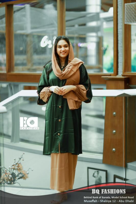 Green and Tan Button-Front Overcoat Abaya - Women's emerald green overcoat with tan base modest Islamic dress featuring button details